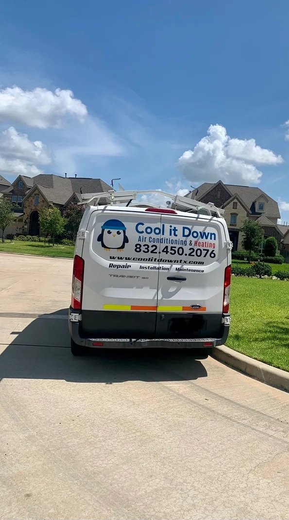 A Cool It Down service van parked at a home in Katy, TX